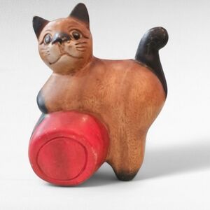 Wooden Cat on Red Barrel Figurine